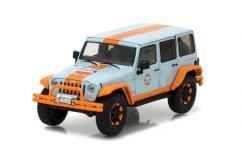 Greenlight 1/43 2015 Jeep Wrangler with Off Road Bumpers Blue/Orange image