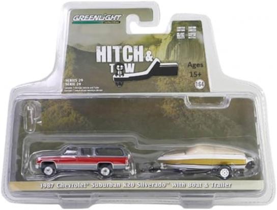 Greenlight 1/64 1987 Chevrolet Suburban K20 Silverado with Boat Trailer And Boat image