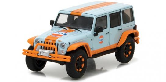 Greenlight 1/43 2015 Jeep Wrangler with Off Road Bumpers Blue/Orange image